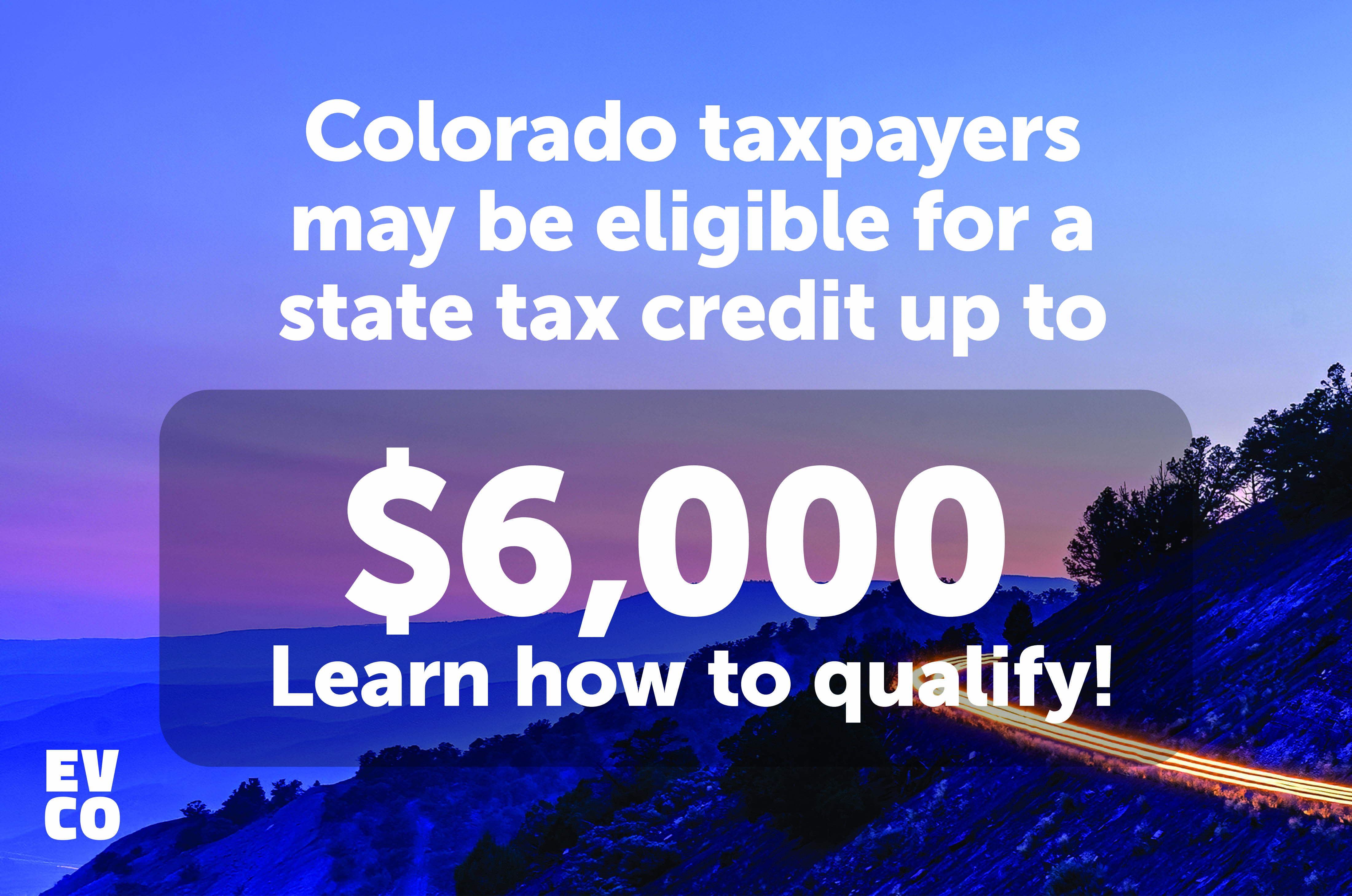 All Colorado tax payers are eligible for a state tax credit. A lit-up mountain road at dusk.