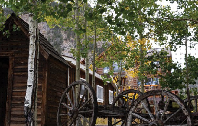 A historical cabin and wagon in Frisco, Colorado