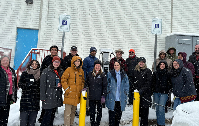 A group photo from the Ready Foods EV Charger ribbon cutting event