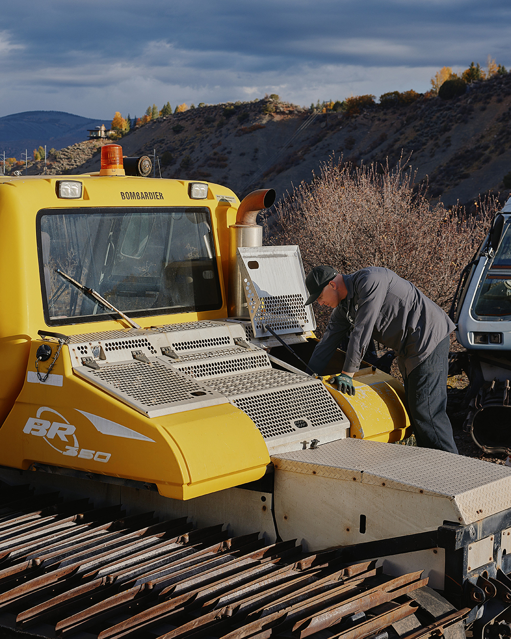Man repairing heavy machinery