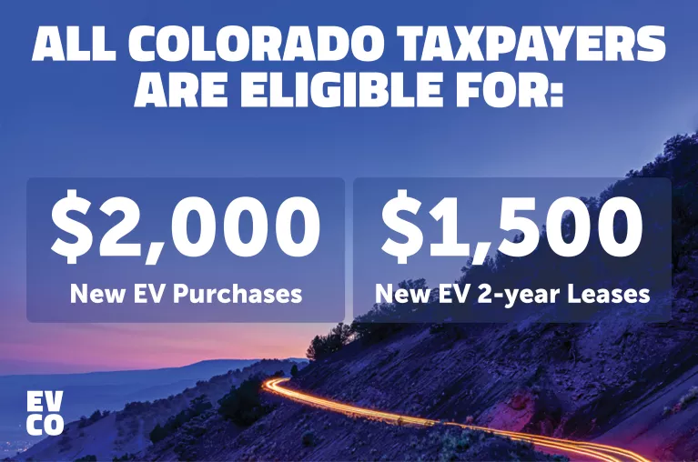 All Colorado taxpayers are eligible for tax credits. A lit-up mountain road at dusk.