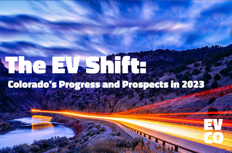 The EV Shift: Colorado's Progress and Prospects in 2023. A mountain road at night with time-lapsed car lights