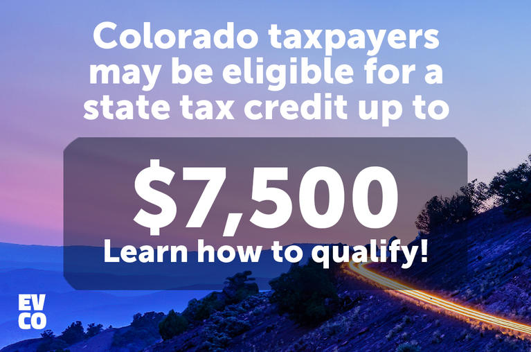 All Colorado tax payers are eligible for a state tax credit. A lit-up mountain road at dusk.